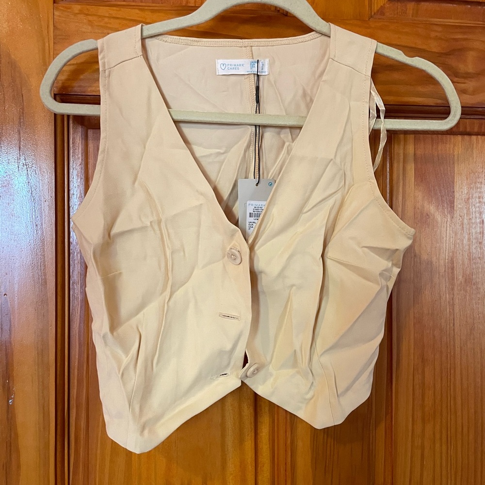 Pastel yellow buttoned vest